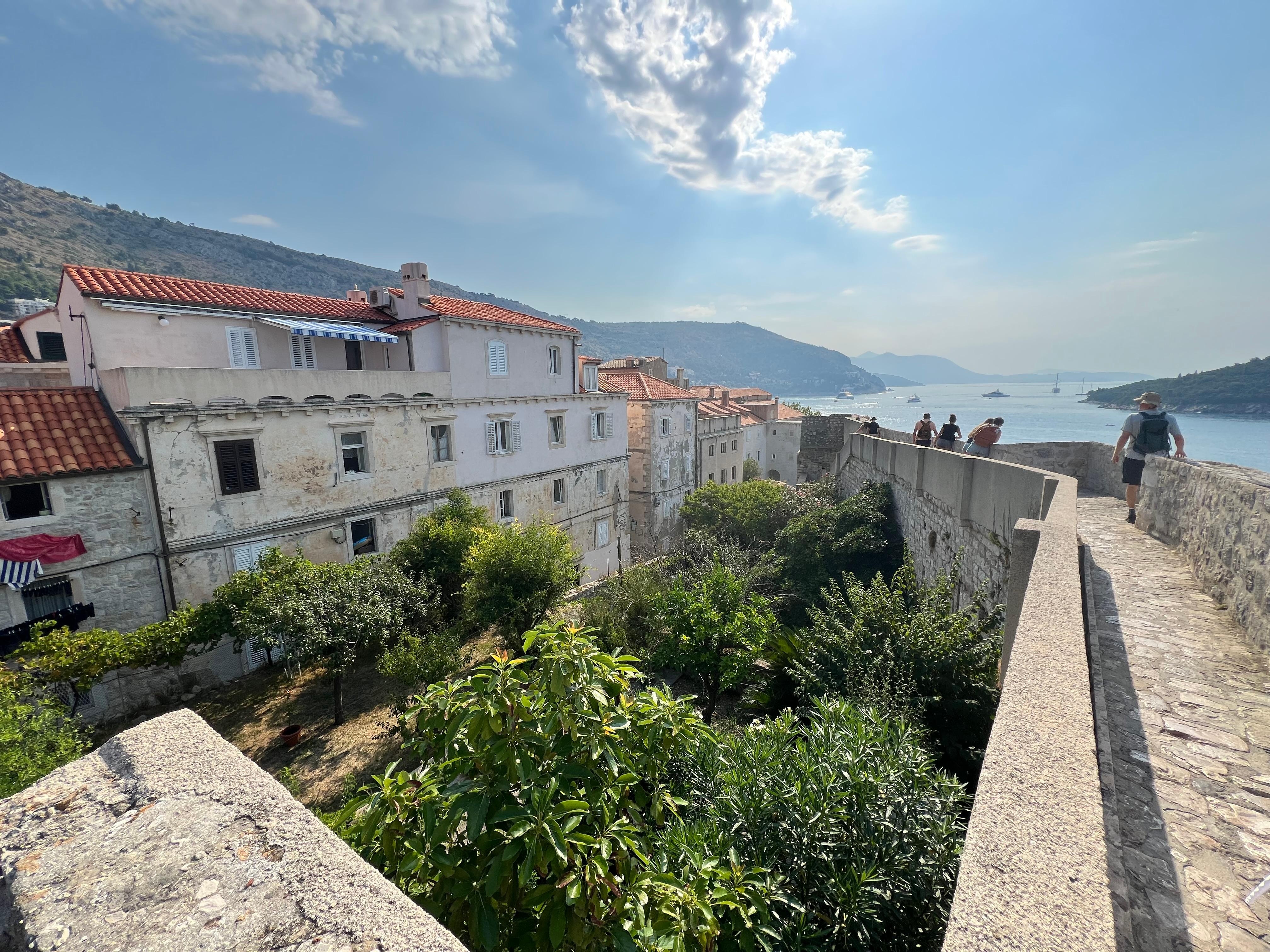 Blue strip awning is terrace - photo taken from wall walk