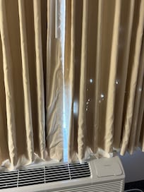 Curtains have holes in them