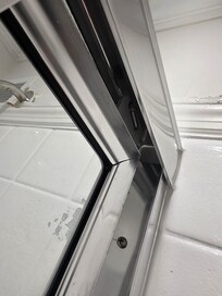 Shower door off track