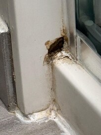 Rust hole and stain is on shower