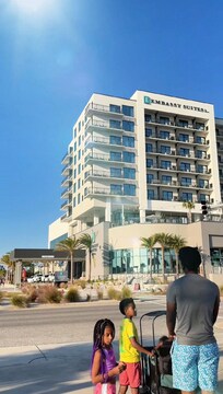 Returning from public beach access across the street from the hotel