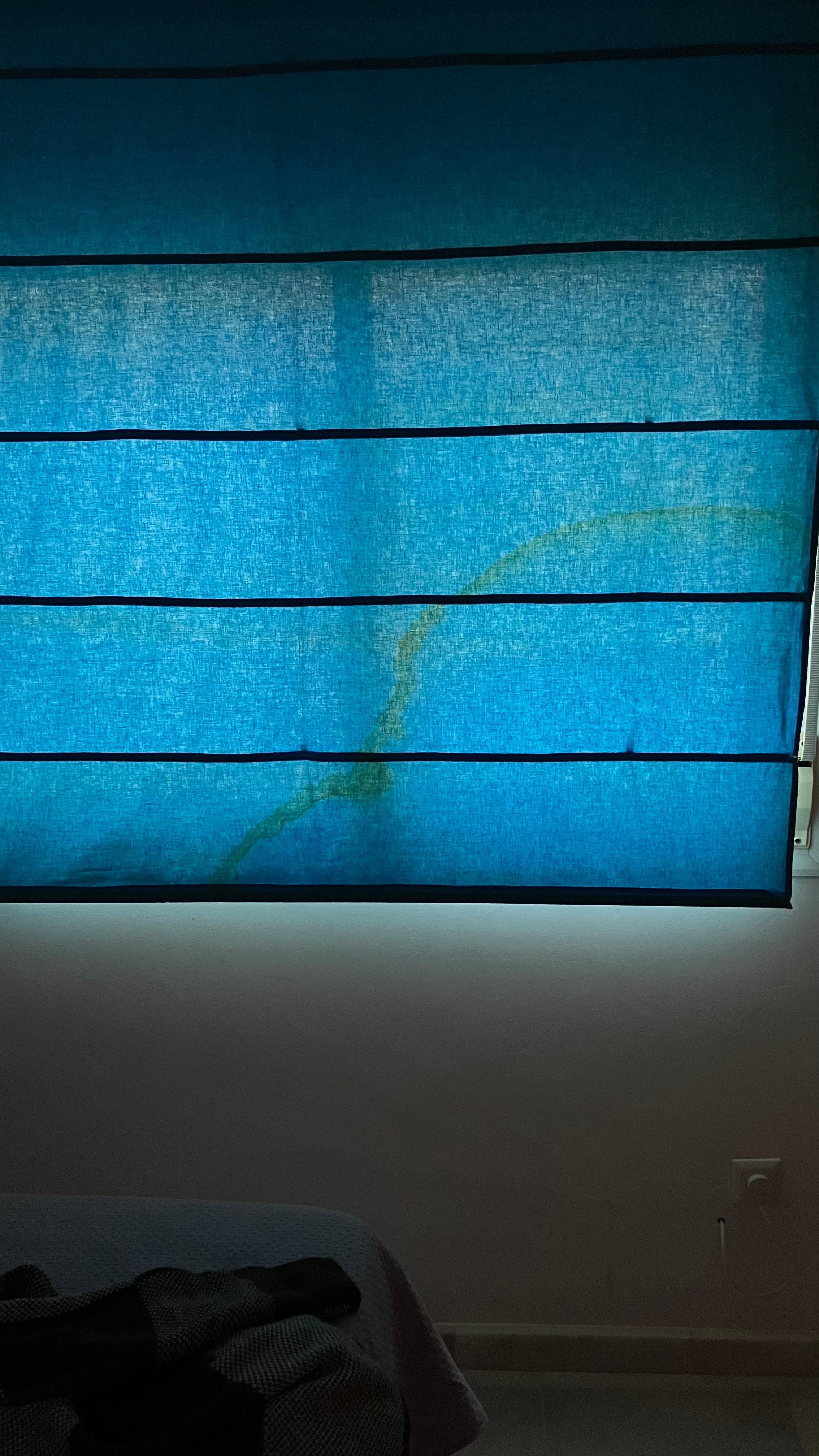 Stained window shade. 