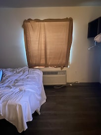 No curtain at the window had to put up a blanket