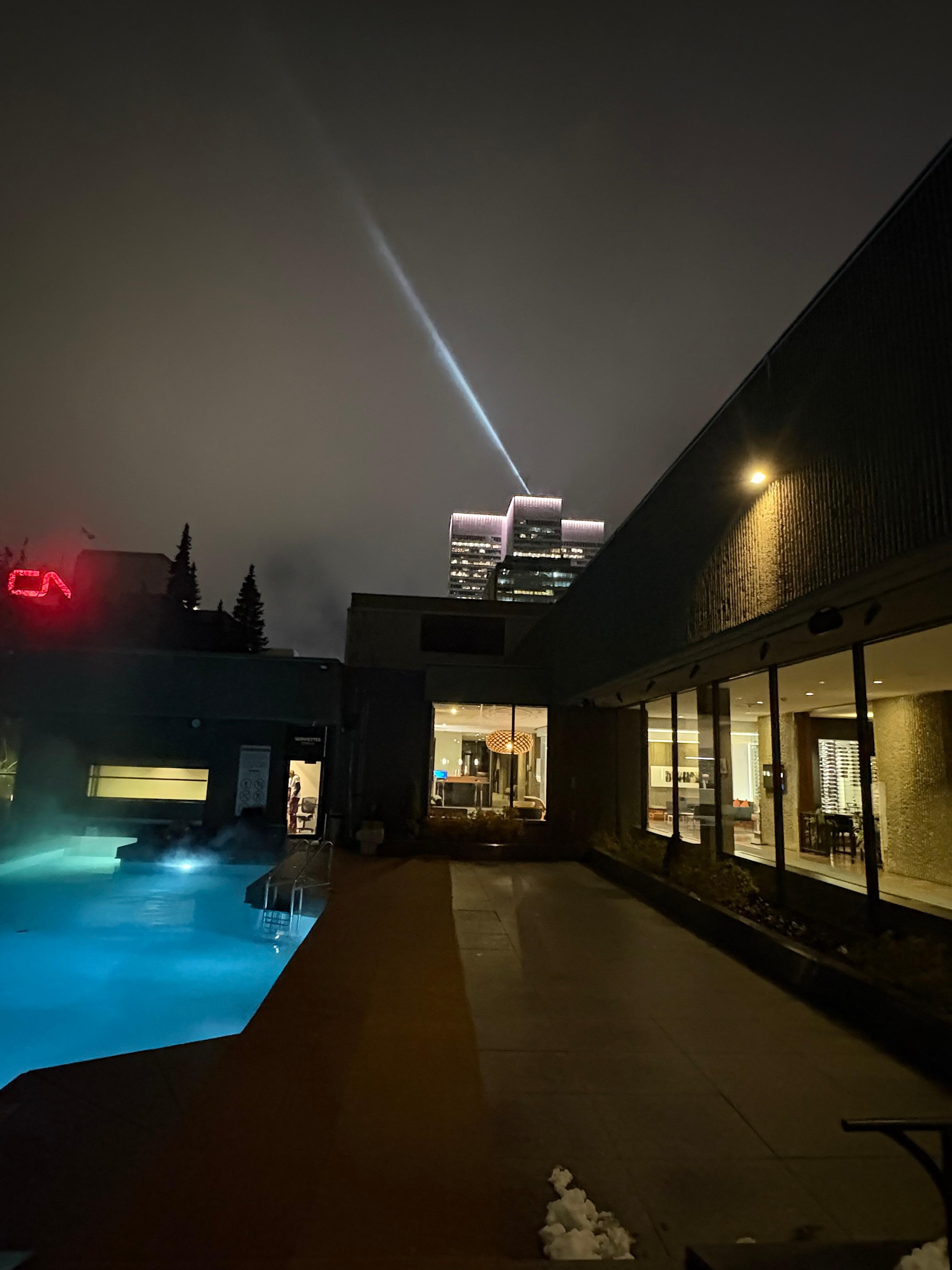 View from outdoor hot tub and pool area on roof.