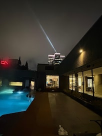 View from outdoor hot tub and pool area on roof.