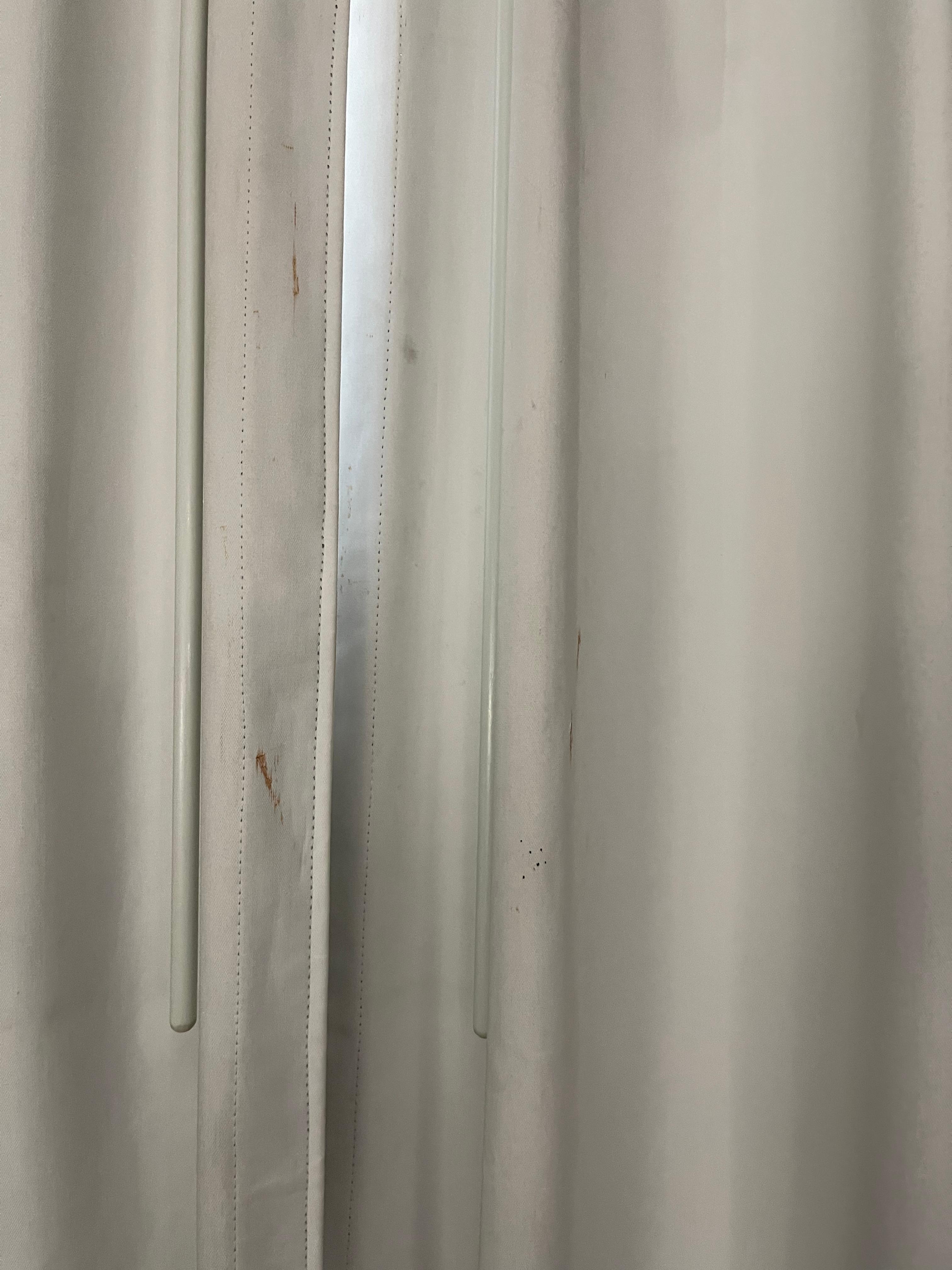 Curtains were very dirty and stained.