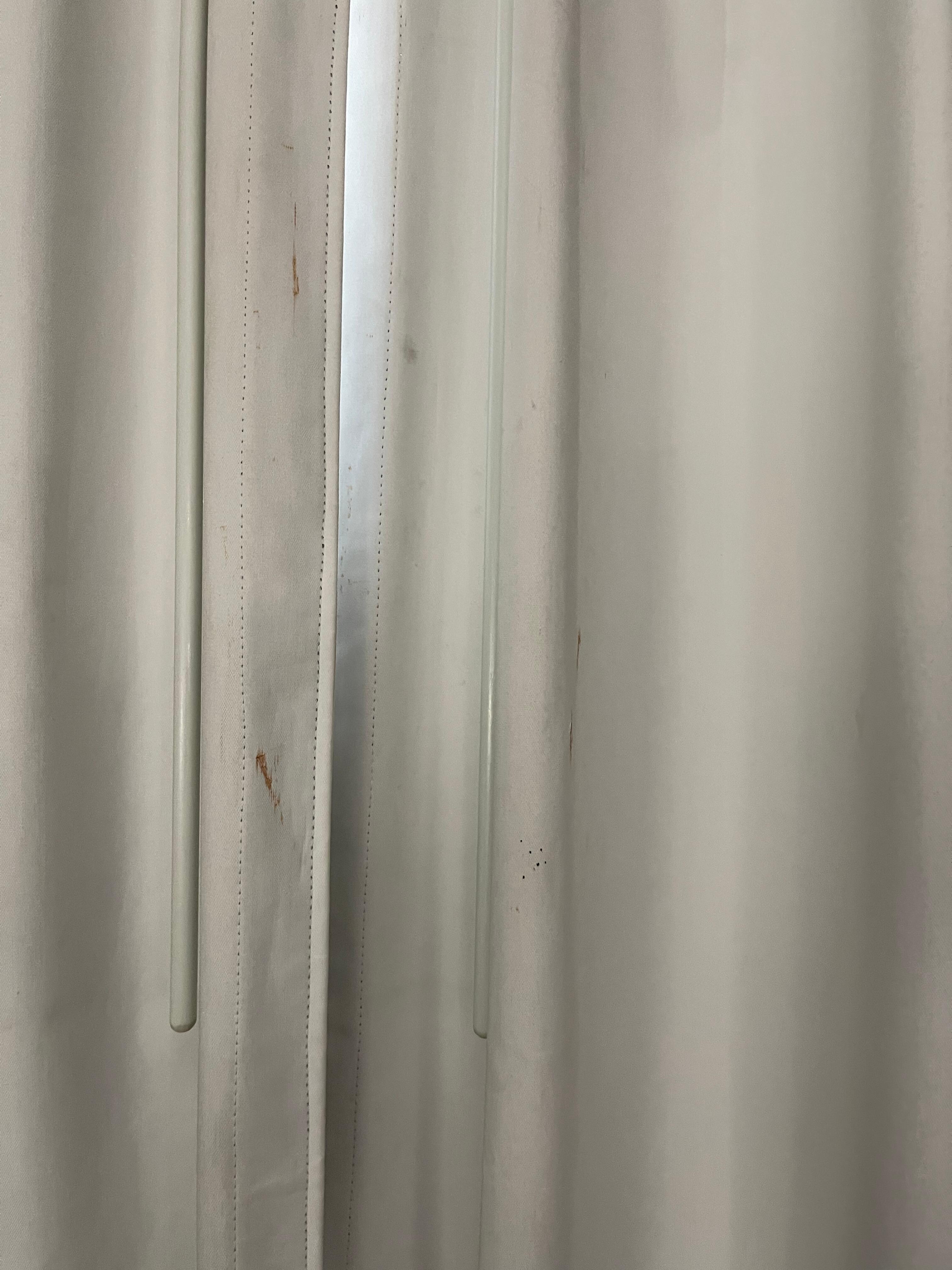 Curtains were very dirty and stained.