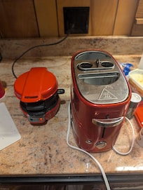 Egg McMuffin maker and hot dog maker makes quick meals
