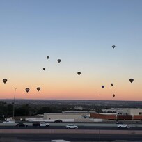 Hot air balloons from our window. They were closer than they look in the pics. Would definitely stay here again.