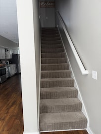 Steps from living room to third floor bedrooms and bathrooms. 15 steps.