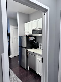 The kitchen has everything you need to have dinner in.