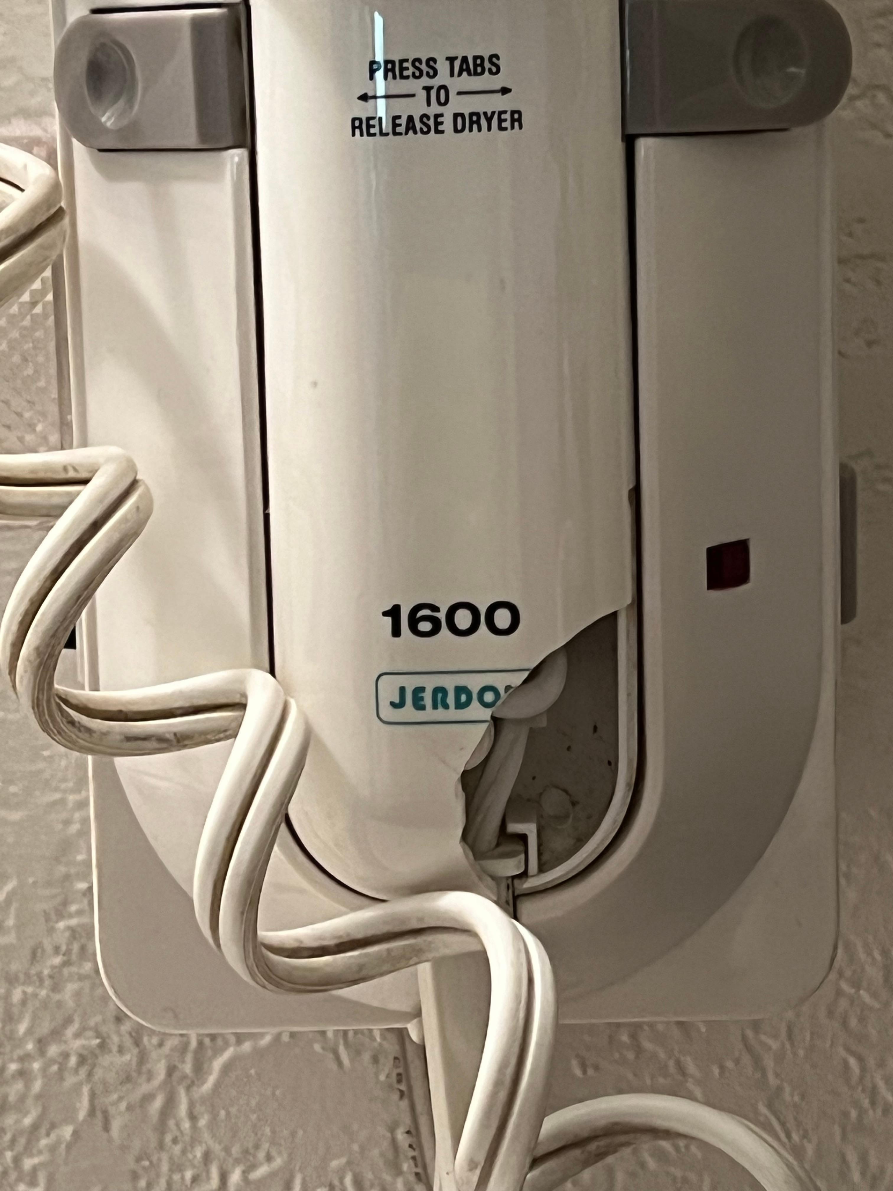 Good thing we bring our own hair dryer, because this one had been broken.