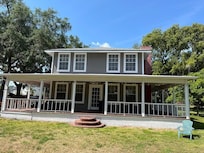 Back porch of the house with little stairs that are great for pictures!