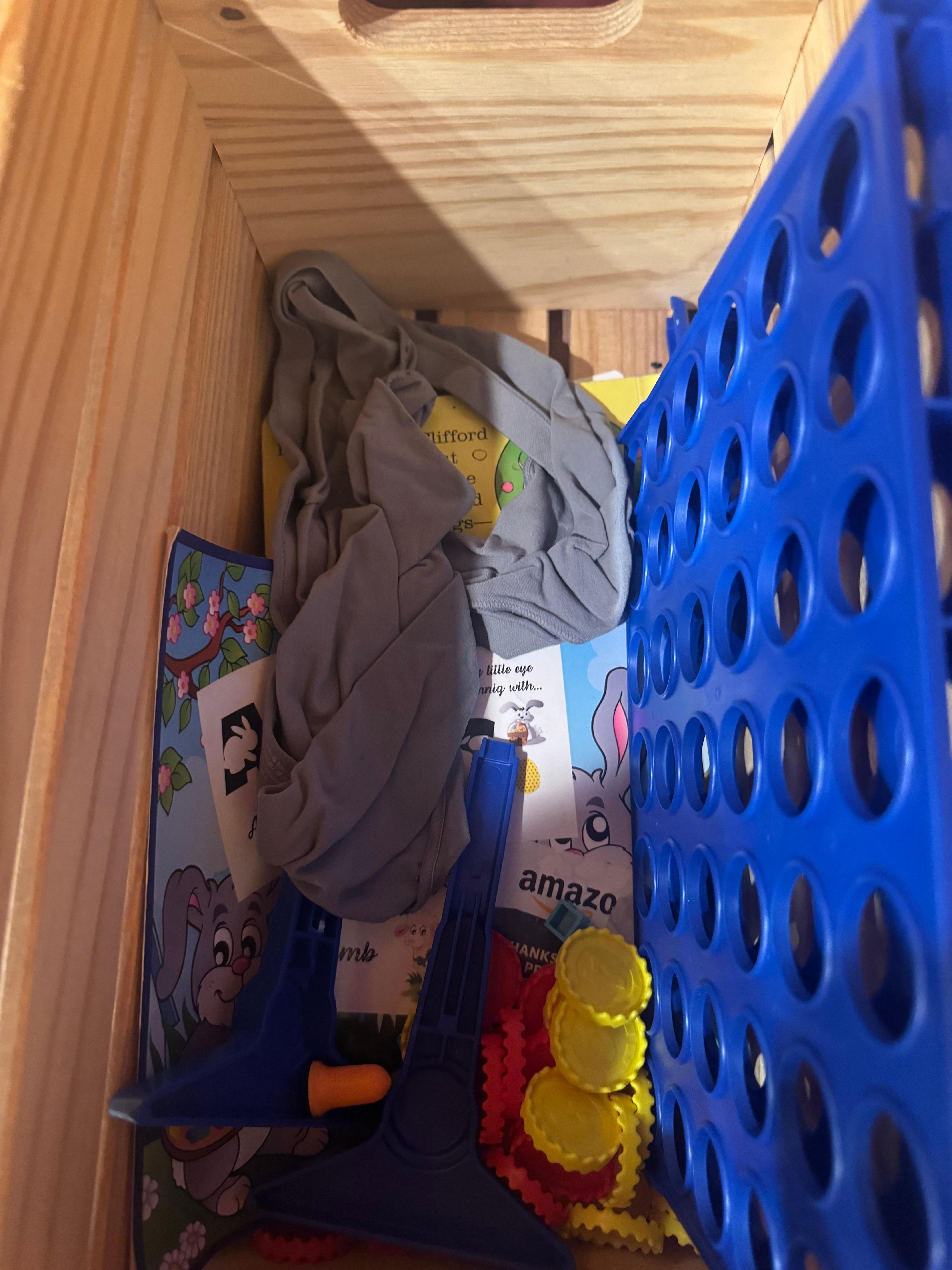 Dirty underwear in the box of games 