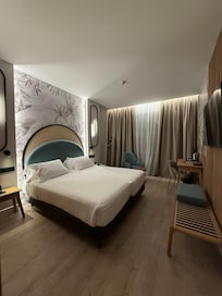 Clean room with a beautiful park view. Fresh air and peaceful atmosphere. Convenient bus stop nearby.