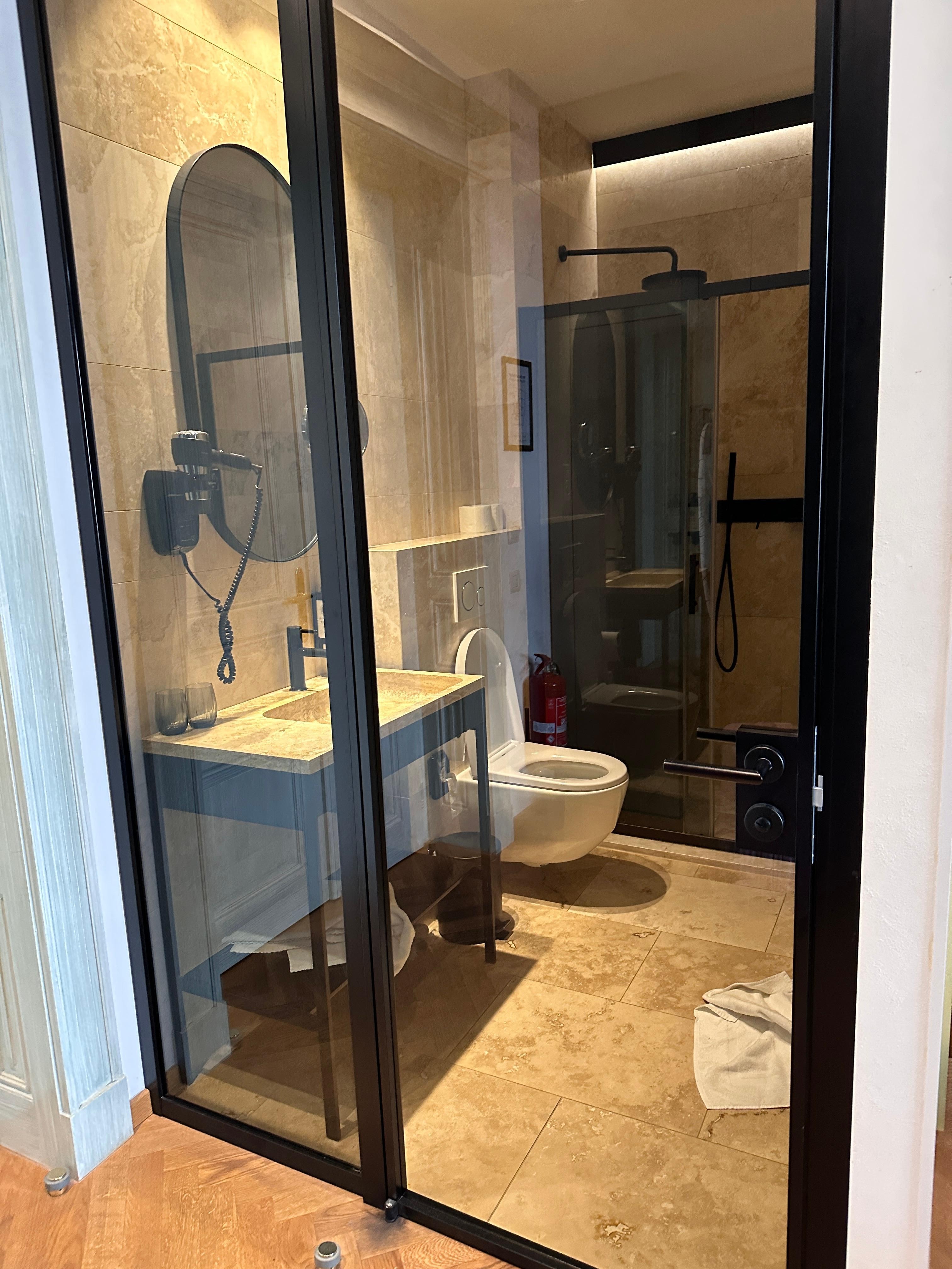 Bathroom... looks great yet no privacy.