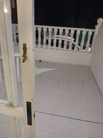 Room 104 - This hook was the only door security to the ground floor balcony. Actual lock was broken.