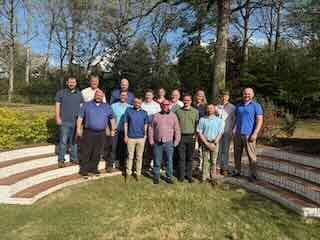 Team meeting - everyone gathered outside of the house with big smiles :)