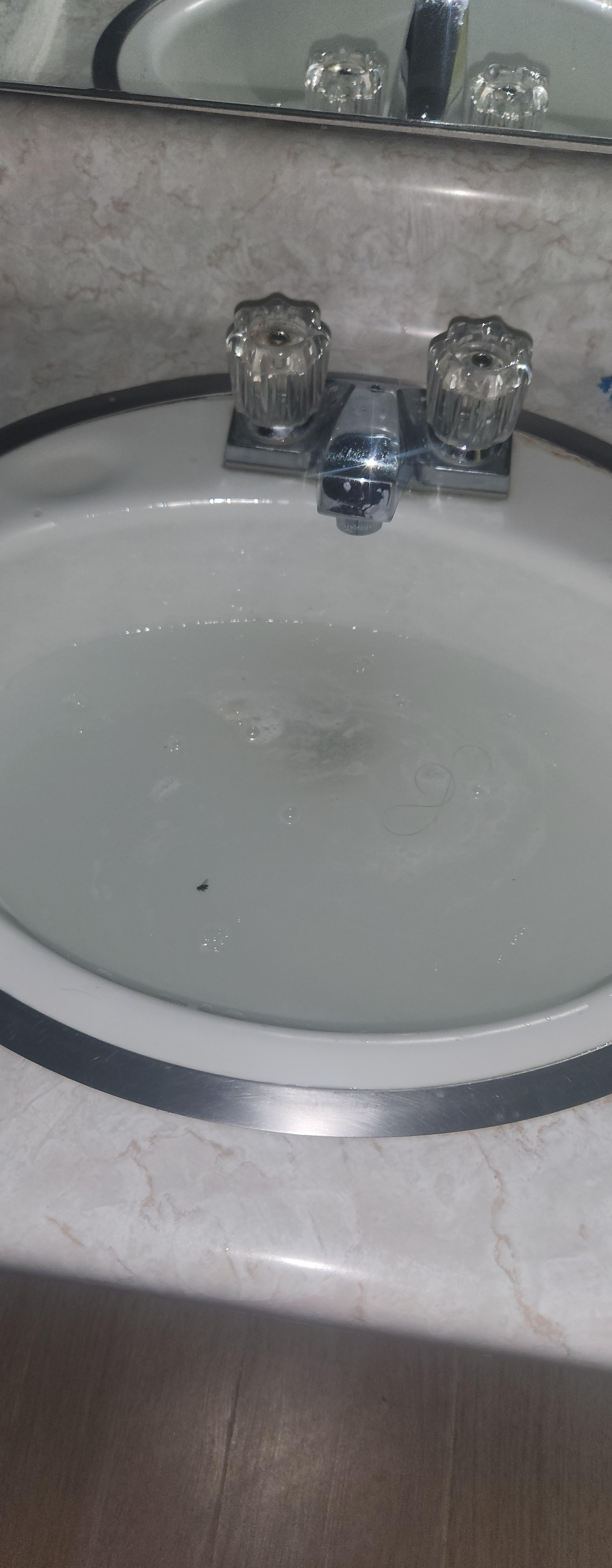 Sink did not drain & the cold water didn't work at all