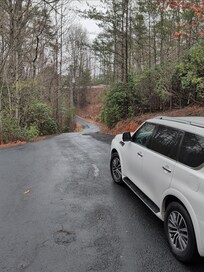 Steep hill to get in and out of property needs to be mentioned.