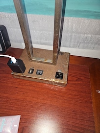 Rusted nightstand lamp.