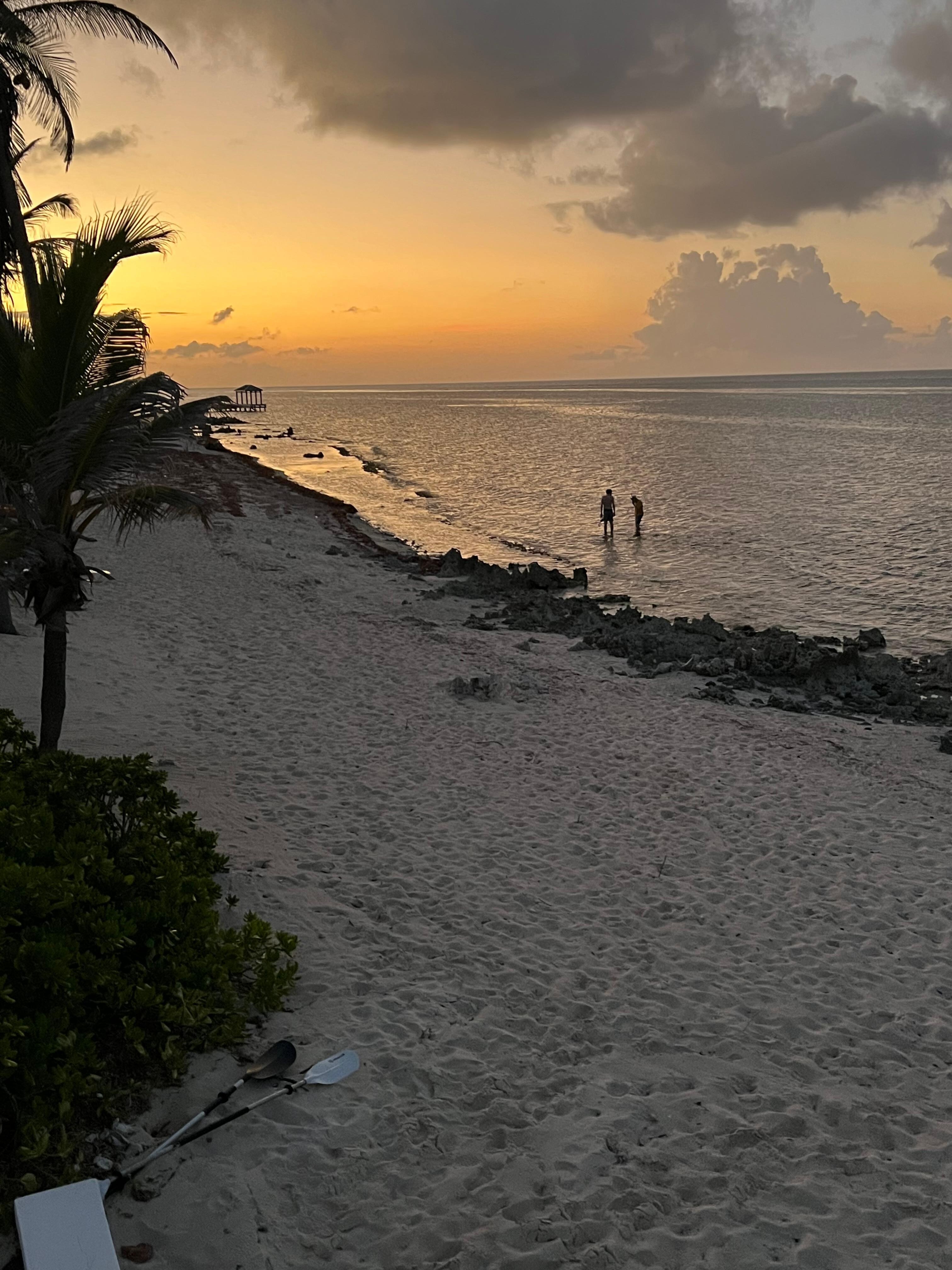 Father and son sunset snorkeling.