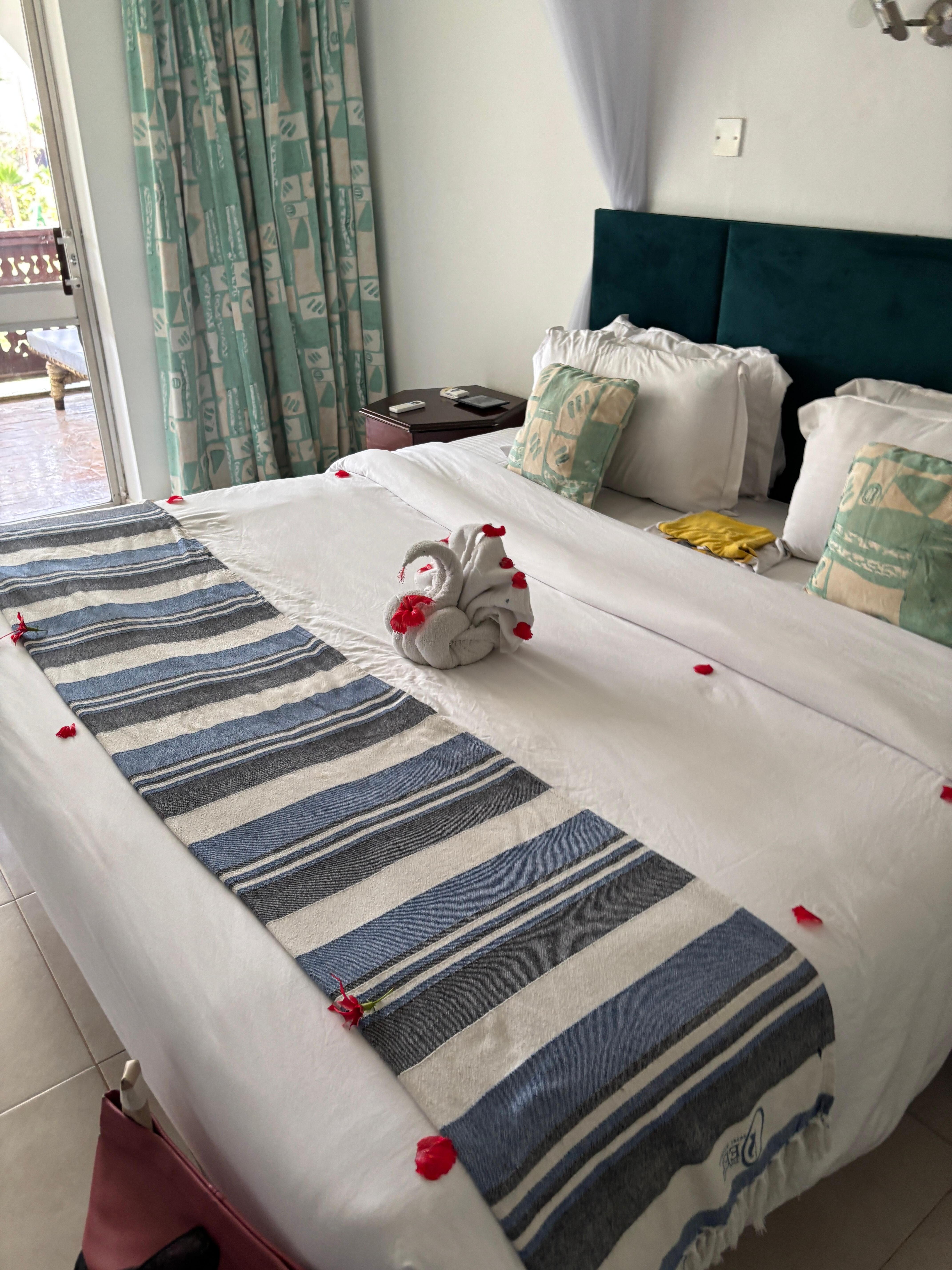 This is the huge double bed with a lovely towel design 