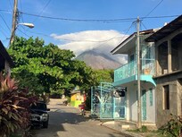 Front of hotel with Concepción volcano in background.