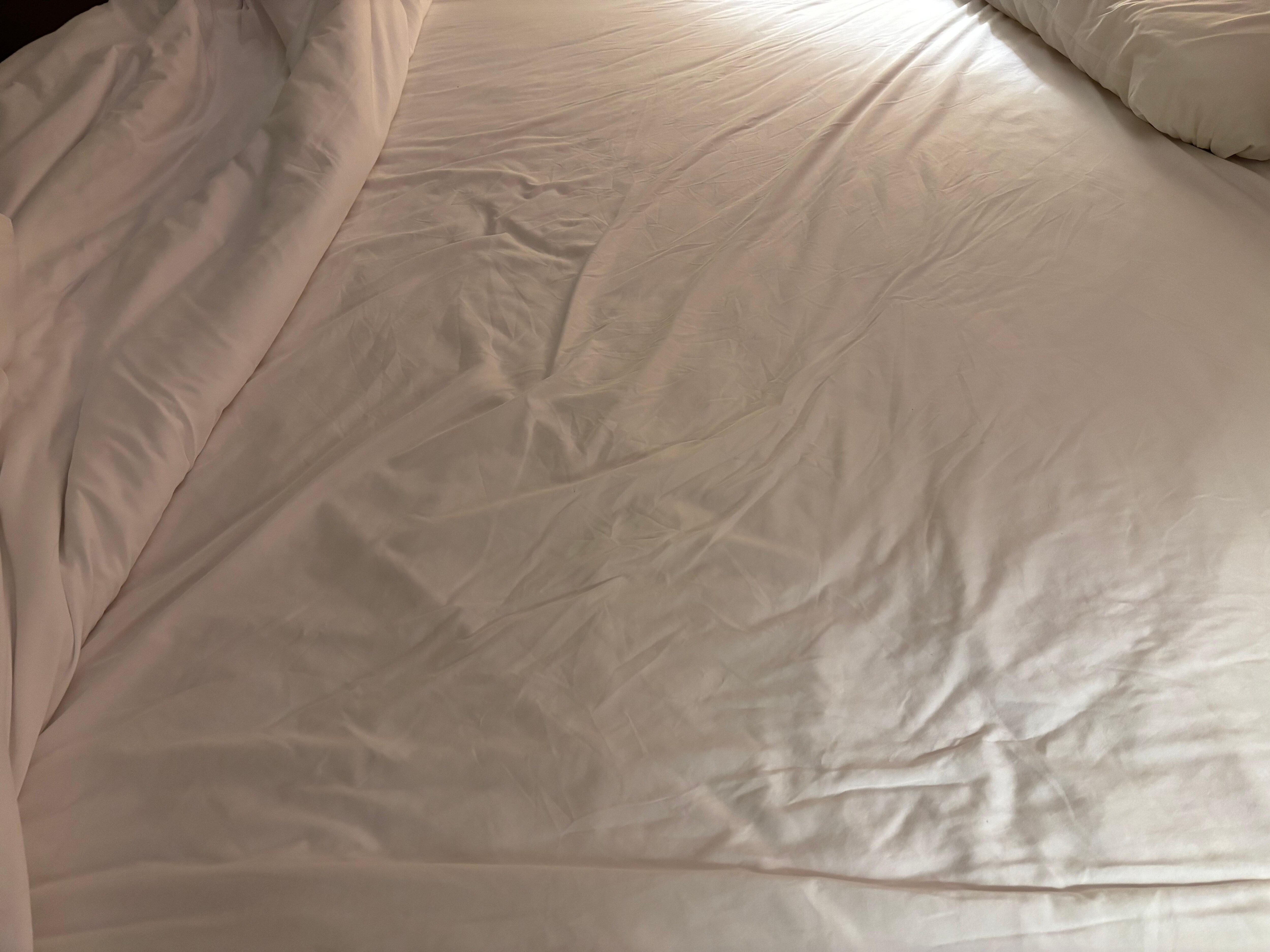 Bed linen not fresh. Unmade bed 