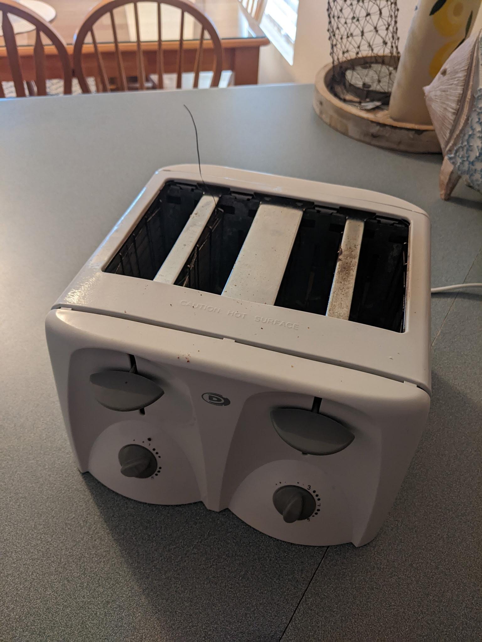 Wire, sticking up from toaster 