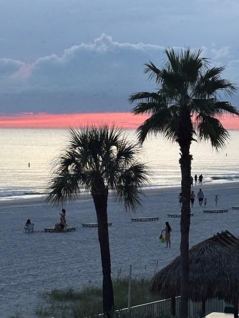 Sunset views with storms behind from the balcony.