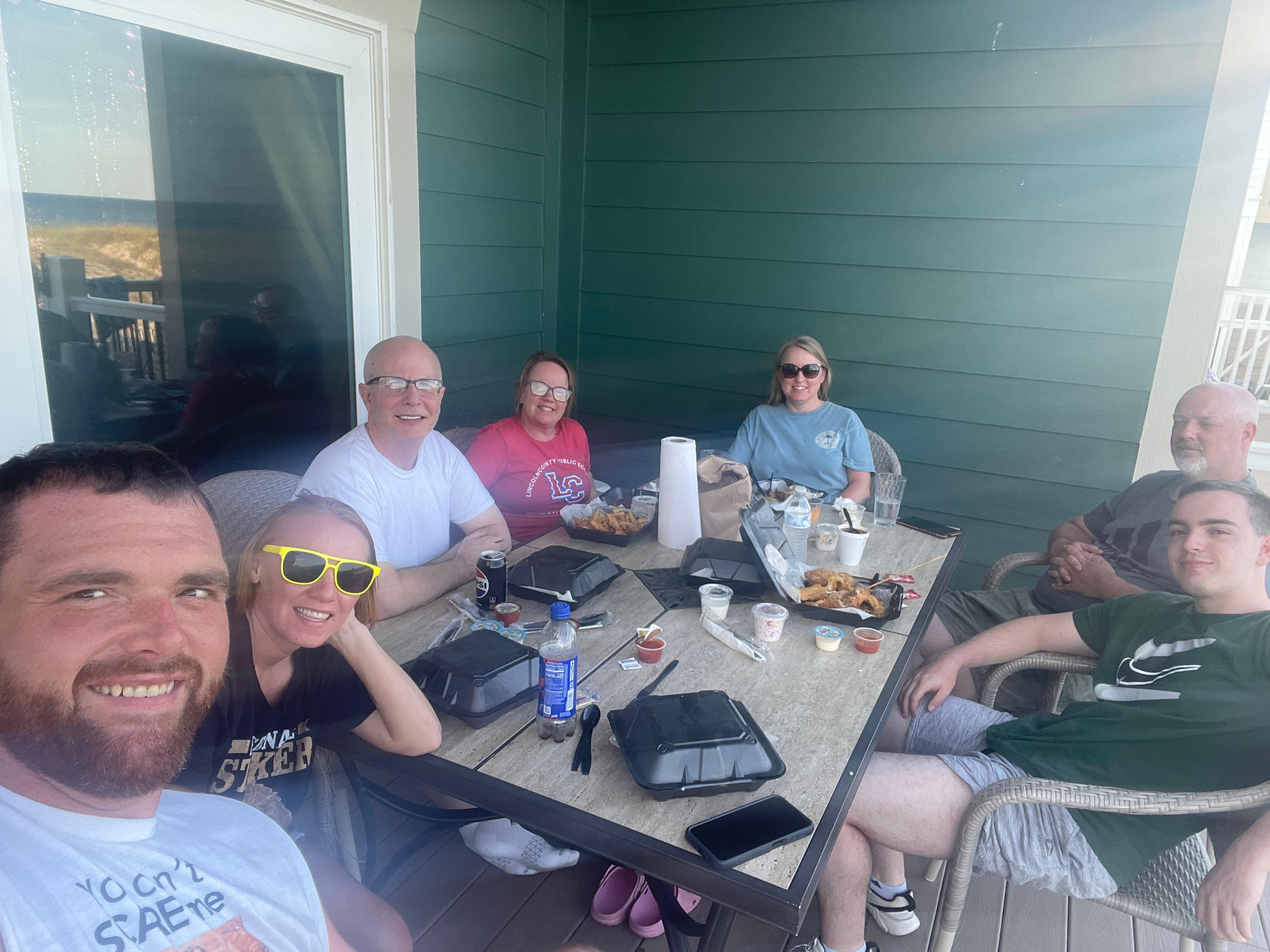 Eating dinner on the balcony. 