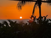 Photo from lanai - there is a power pole (not pictured) that blocks some view, but nothing the owner can do about it.
