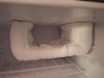 Someone should defrost the refrigerator occasionally!