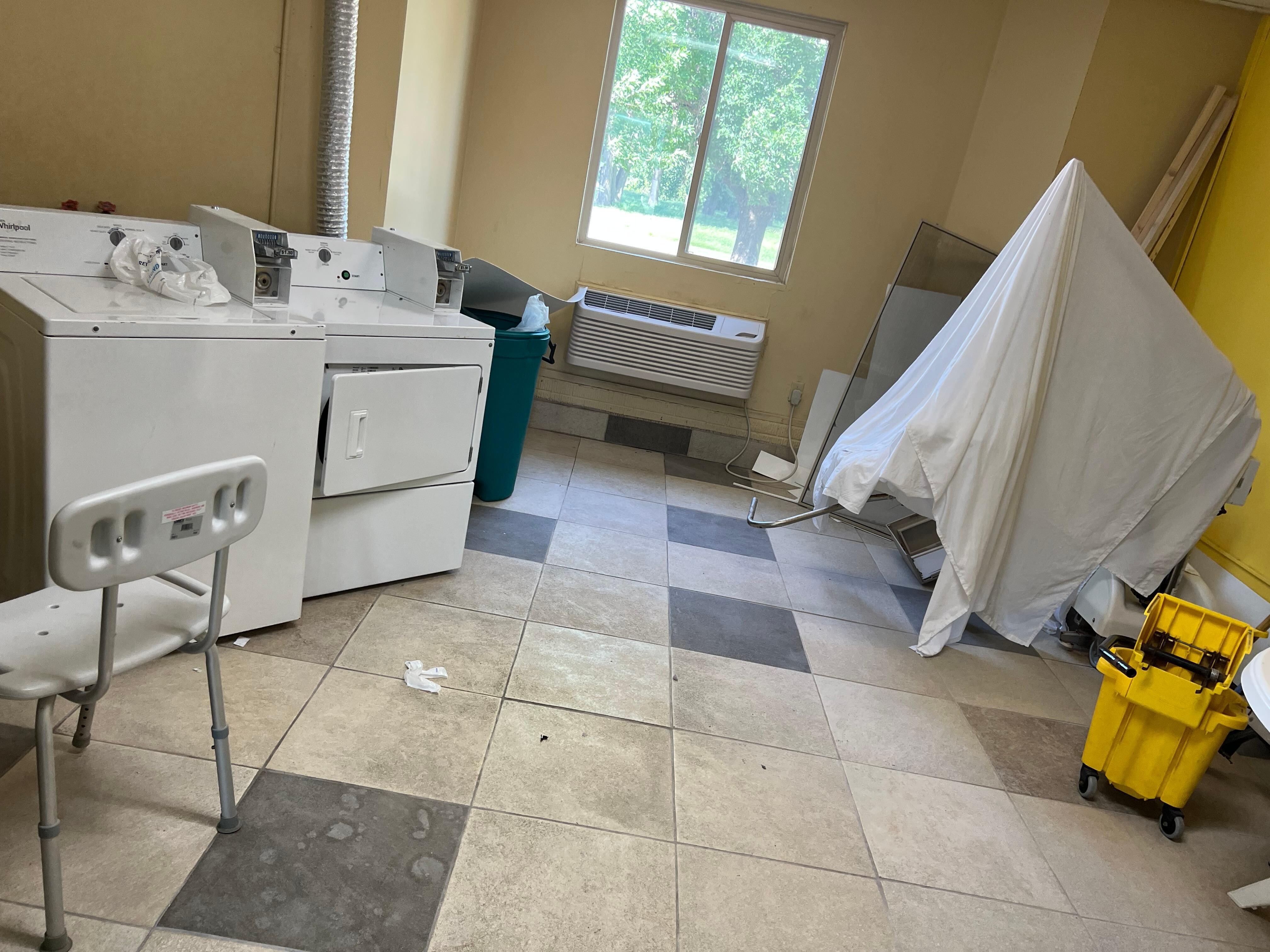 This is where you can wash your clothes with all this equipment in it 