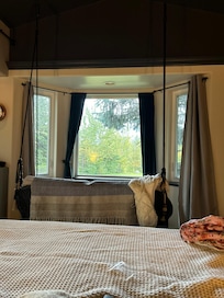 View from bed! Swing was cute & great for relaxing, husband took a nap on it while watching football game on his tablet 😄