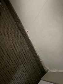 Floor and walls had tearing and holes