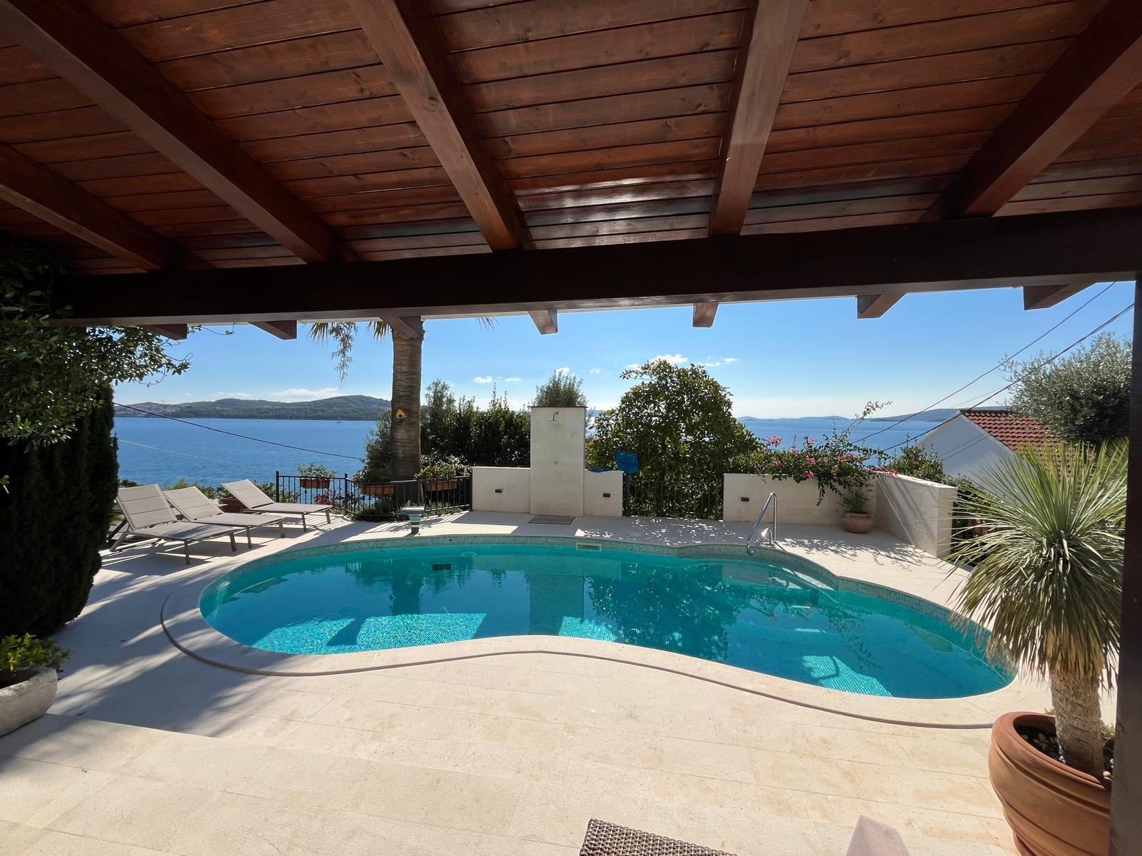 Heated pool, view from the comfortable outdoor sofa