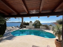 Heated pool, view from the comfortable outdoor sofa