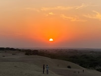 Sunset in the desert , seen during desert jeep safari