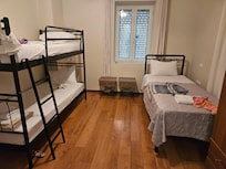 Bedroom 2 with 3 beds