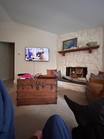 Nice size living room with a comfy sofa