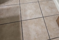 Bathroom floor with hair everywhere, it was in the tub as well.