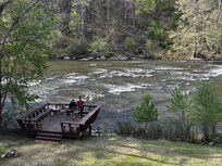 View from the main floor deck looking down to the river.