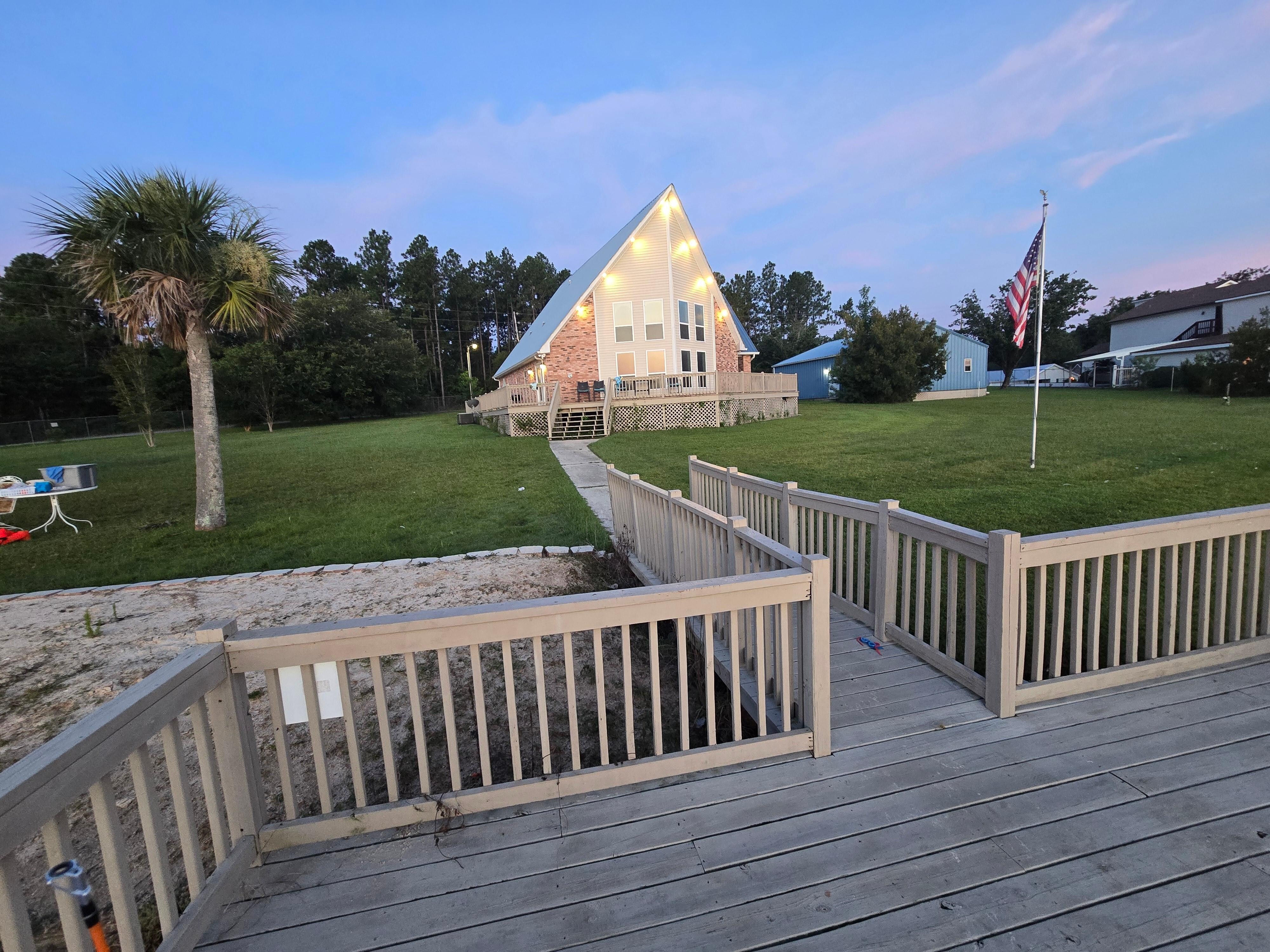 Zoomed out view of house from dock