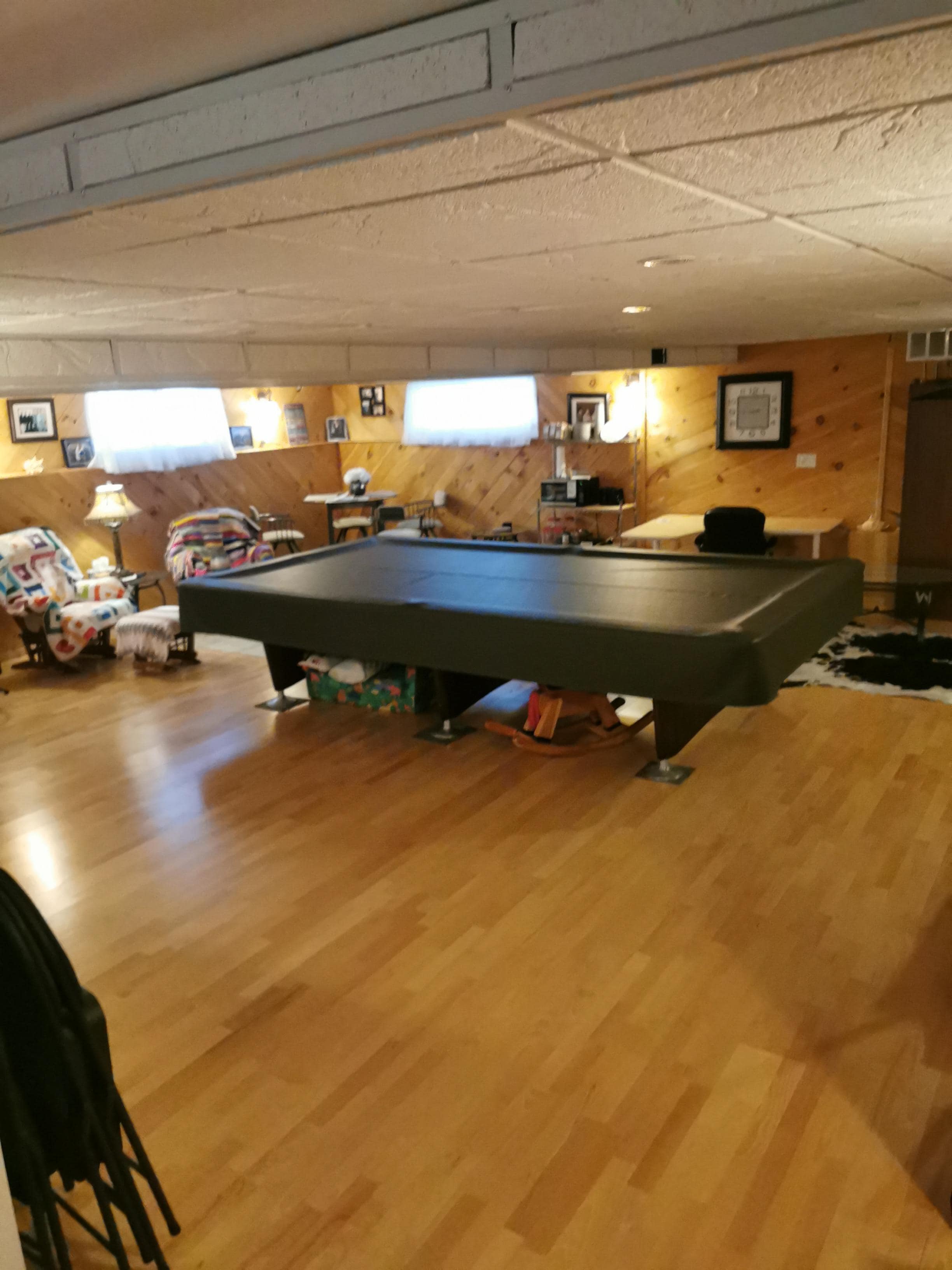 Common area with a large pool table.