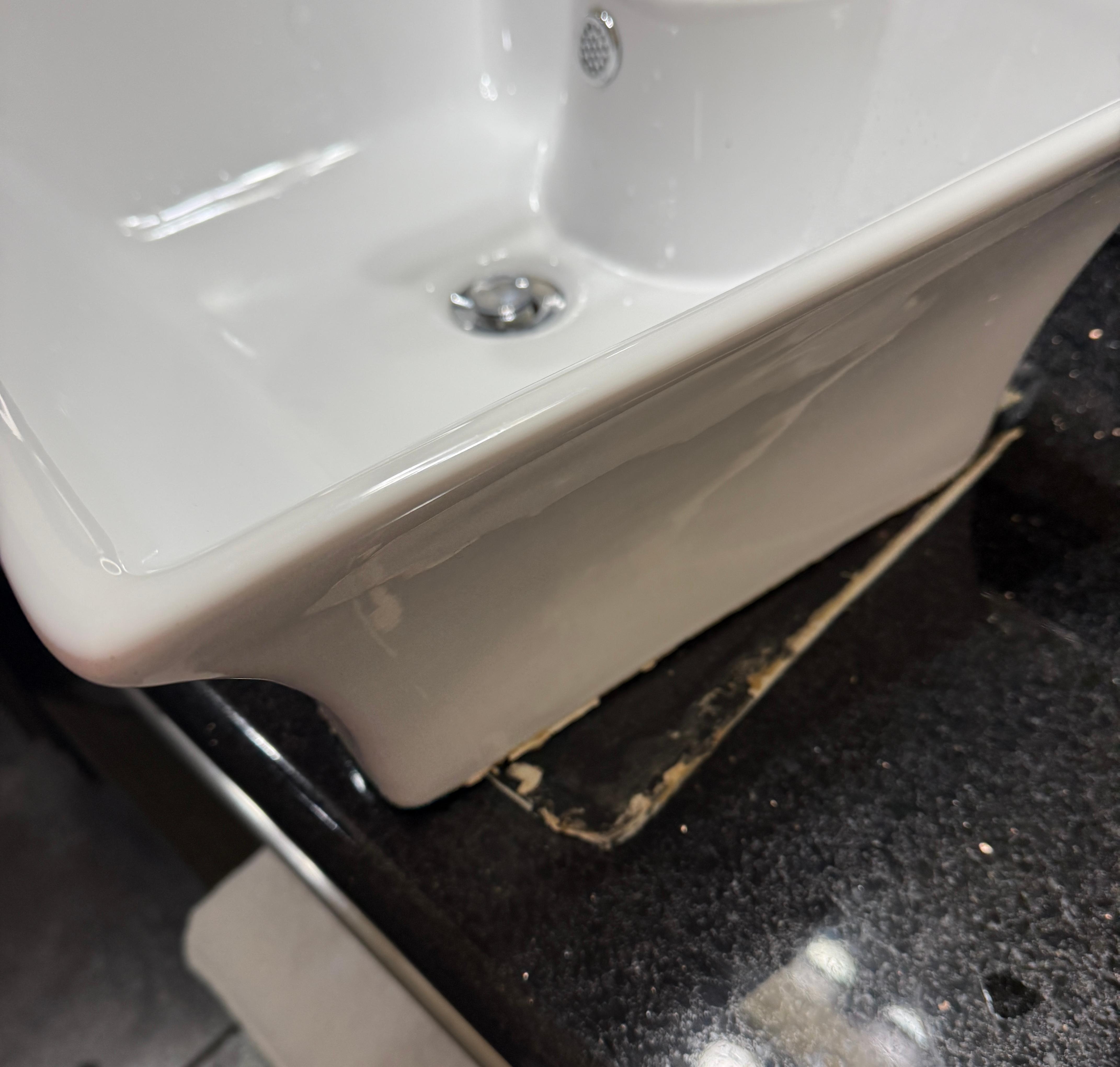 Metal rod wrapped in foil shoved into faucet to serve as a handle 