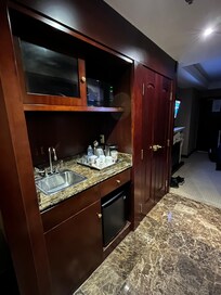 Nice kitchen area with fridge and in room coffee