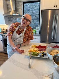 Huge refrigerator and nice bar-counter to set food on.