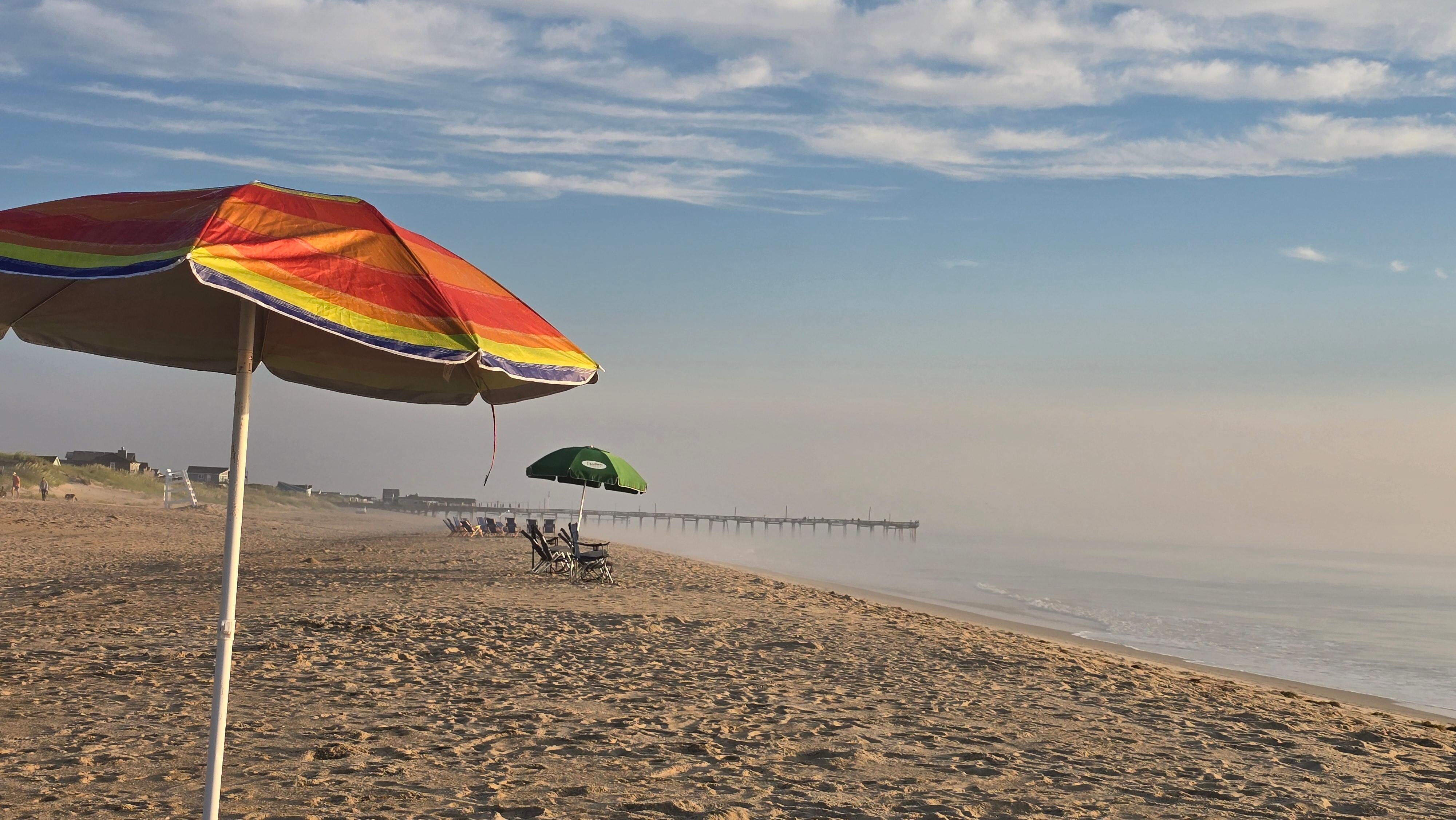 A view down the beach to FishHeads at the Outer Banks pier.